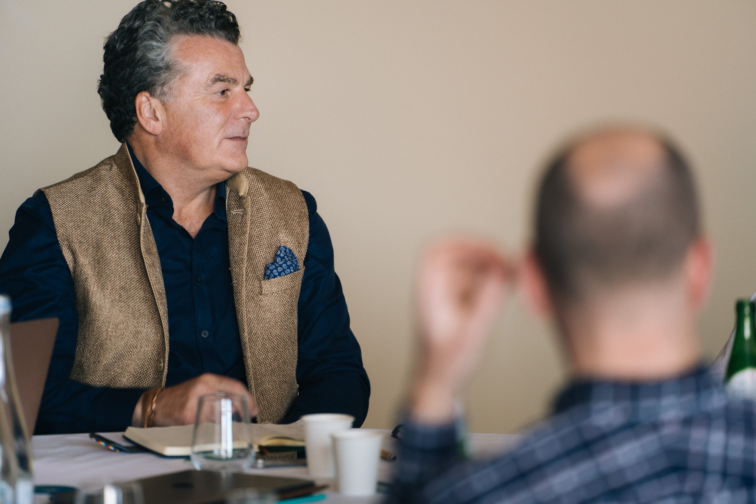 Assheton in a boardroom advisory session